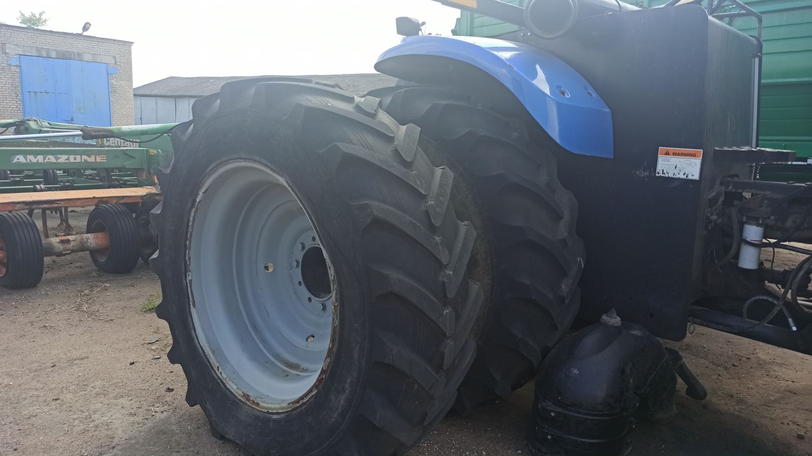 Трактор Нью Холланд Т9040